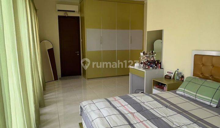 Rumah Homey 2 Lantai Semi Furnished di Discovery Conserva Ut 14746 2