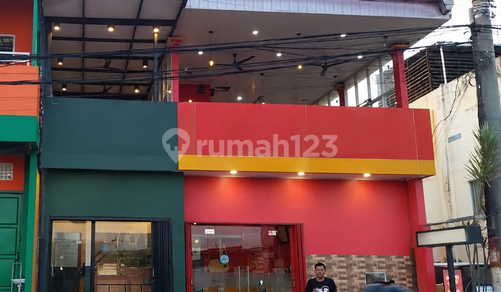 Two-Story Cafe Building with Two Connecting Doors in Sukarame, Bandar Lampung Two-Story Cafe Building with Two Connecting Doors in Sukarame, Bandar Lampung