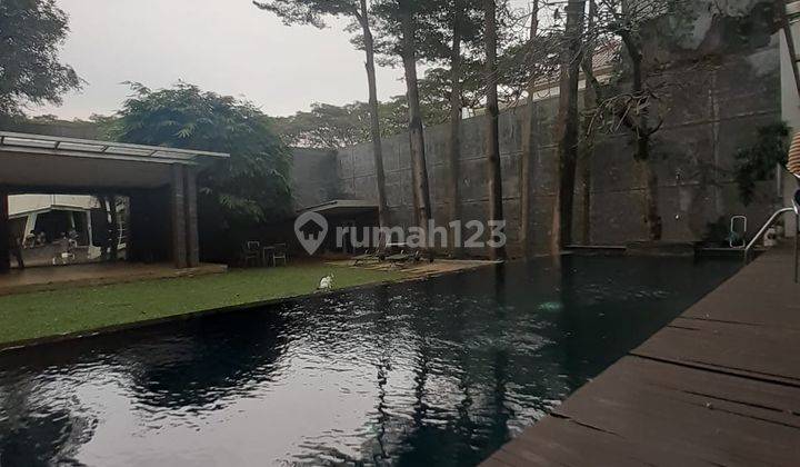 Rumah Gaya Tropis 2 Lantai With Pool di Raffles Hills, Depok 1