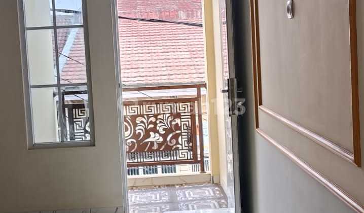 FOR SALE Quick!! 2-Story House in Poris Indah, Palem Raya Street - Tangerang 2