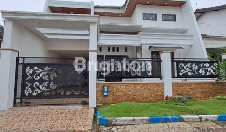 Rumah cantik, kondisi baru siap huni di Araya Malang