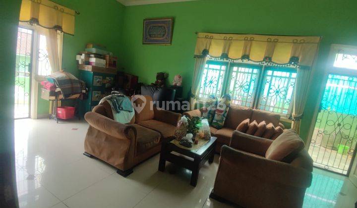 Dijual cepat rumah taman kencana 11x15 2 lantai hadap barat 1