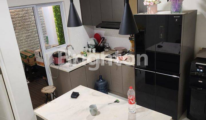 Rumah minimalis modern 2 lantai di lingkungan asri dan nyaman 2