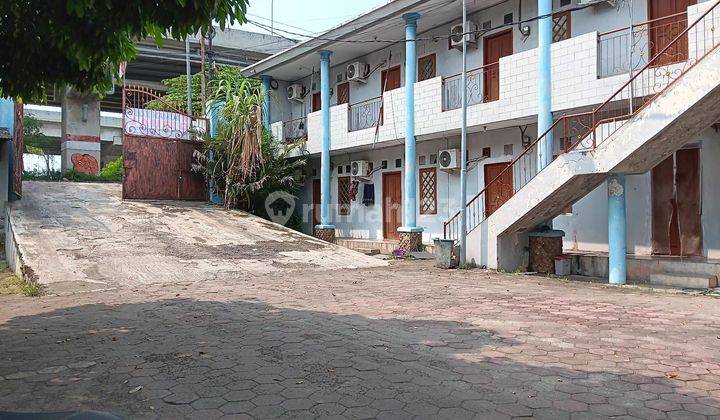 RUMAH KOST 54 KAMAR TEPI JALAN INSPEKSI KALIMALANG JAKARTA TIMUR 1