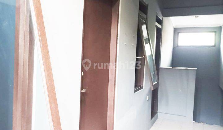 Rumah 1,5 Lantai 4 Kamar Sudah Renovasi Siap Huni Dekat Pasar Modern 2