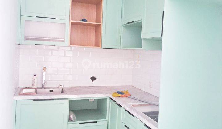 Rumah 2 Lantai 4+1 Kamar Semi Furnished Hadap Utara 2