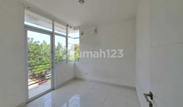 A 2-story house with 3 south-facing rooms in Serpong Natura City. 2