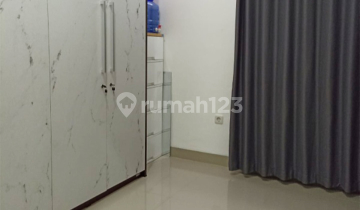 2-story house with 4 bedrooms, fully furnished in Aryana Karawaci 2