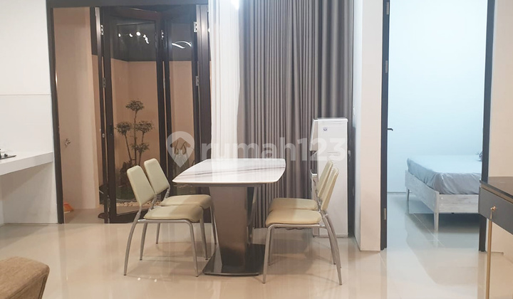 A 2-story, 3-bedroom fully furnished house near Cisauk Station.