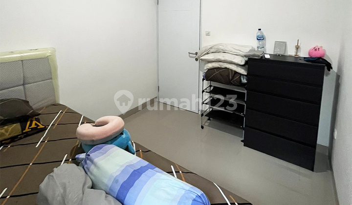 2-story house with 4 bedrooms facing east in Aryana Karawaci 2