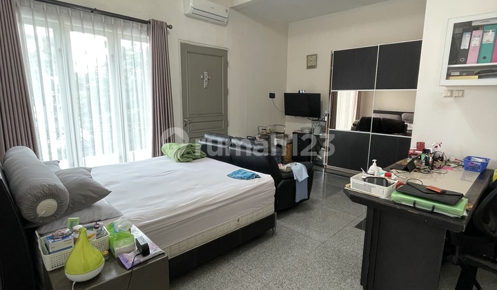 Corner house surrounded by garden and outdoor space at an affordable price in Permata Buana. 2