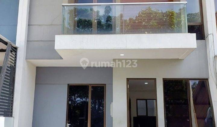 RUMAH MINIMALIS MODERN SIAP HUNI DI GRAHA RAYA 1