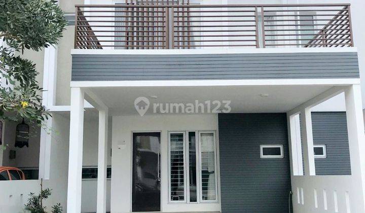 RUMAH MINIMALIS DENGAN BALKON DALAM CLUSTER 1