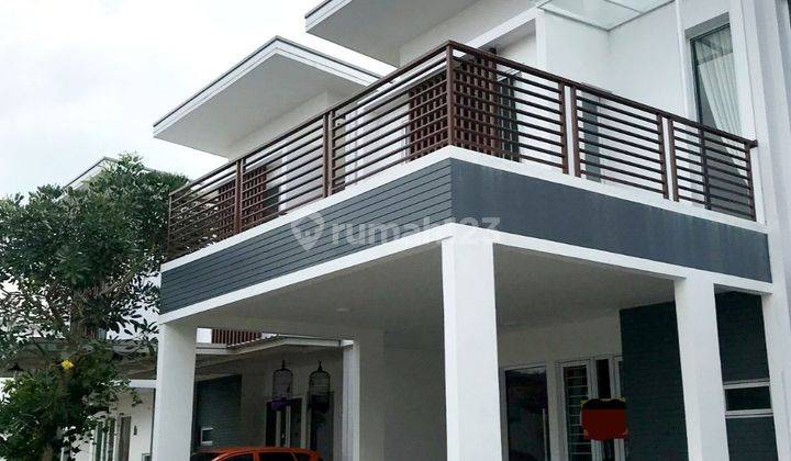 RUMAH MINIMALIS DENGAN BALKON DALAM CLUSTER 2