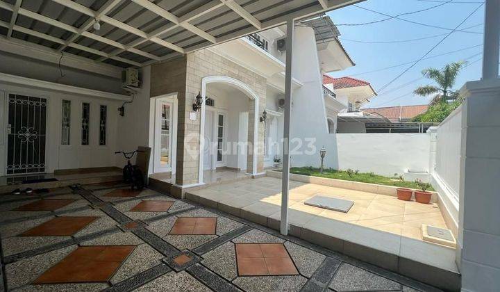 Rumah 2 Lt Modern Siap Huni Bagus Startegis Dicluster Taman Puspa 1