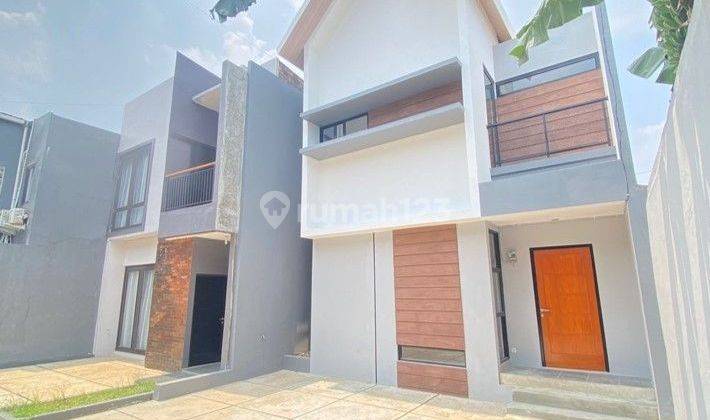 Rumah modern murah 2 lantai 10 menit ke BSD hadap barat J22935 1