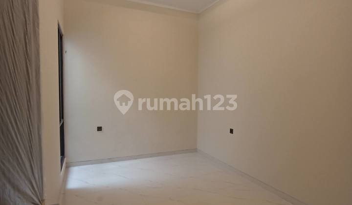 Contemporary Minimalist Brand New 2-Story Hook House in Manyar Jaya Area
