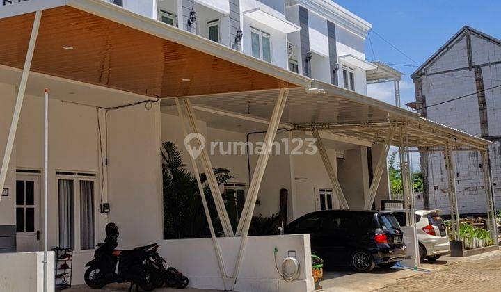 Rumah Baru Minimalis 600jt an 2 Lantai, di Malang 1