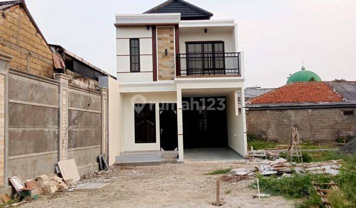 Rumah 2 lantai Desain Bali 900 jt an Cimanggis Depok 2