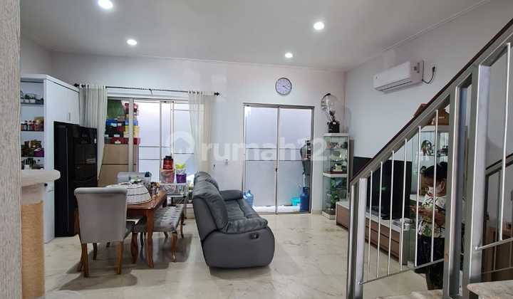 Rumah Golf Island Cluster Harmony siap huni kondisi bagus