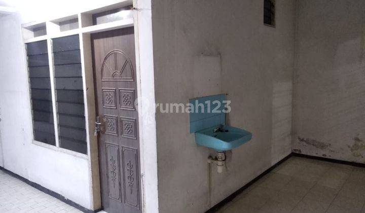 Jual Rumah SHM Butuh Renovasi hadap Barat di Kutisari Indah 2