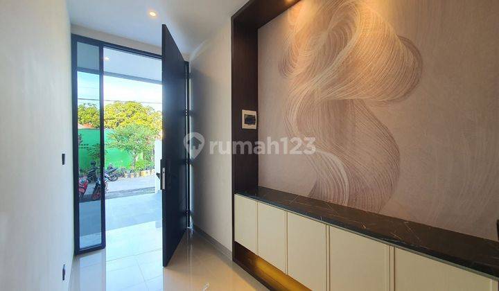 Rumah Babatan Pantai hook modern minimalis 2lantai 2