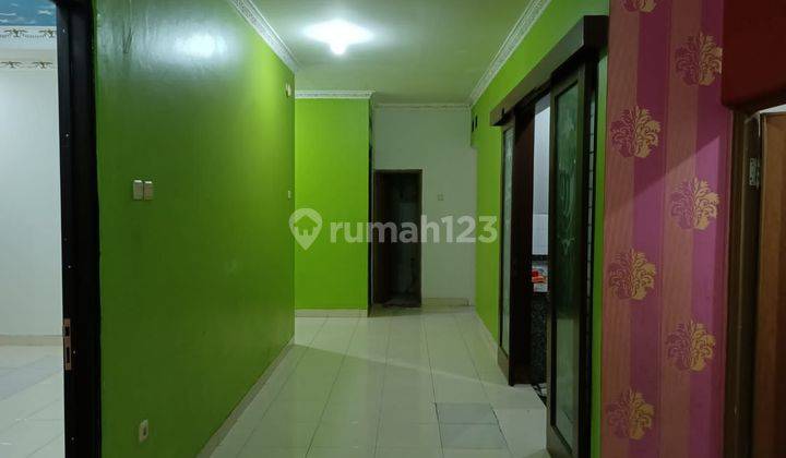 Rumah 1,5 lantai di The Address Cibubur 2