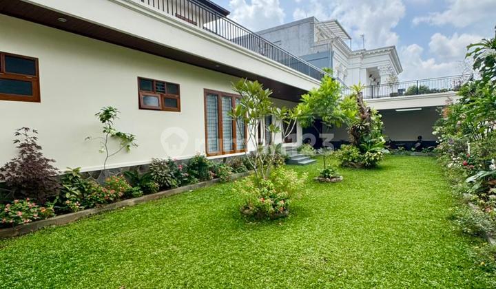 Rumah Design Tropical Modern Lokasi Depan Taman Komplek Terdepan 2