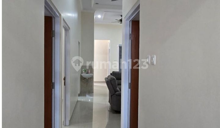 Jual Rumah Unfurnish Lelang Cash Only Lokasi Strategis dan Bebas Banjir di Jl.metlandv 2