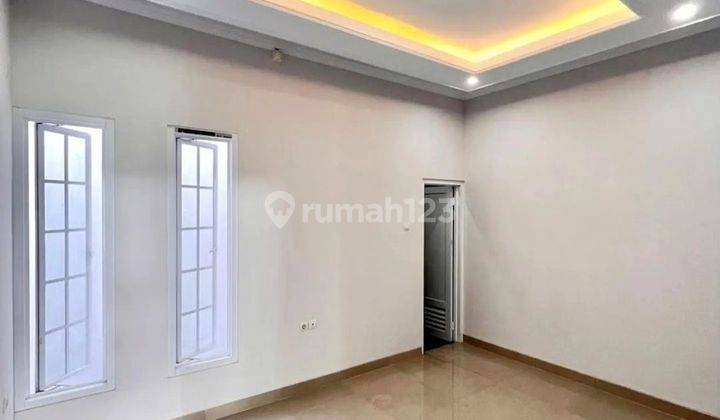 Rumah Mewah dalam cluster 2.5 Lantai nyman lega strategis tegis  2