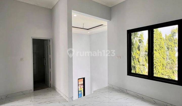 Rumah 2 Lantai Modern Tropical Strategis Tanah Baru Depok  2