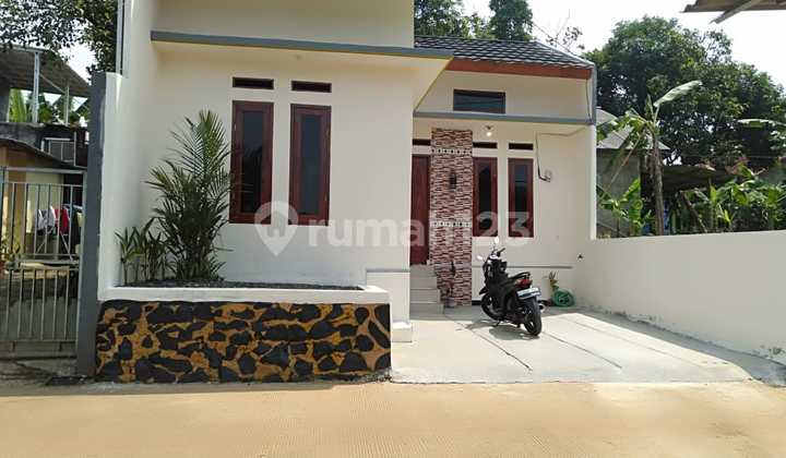 Dijual rumah cash tampilan manis dekat ke jalan Tol 2