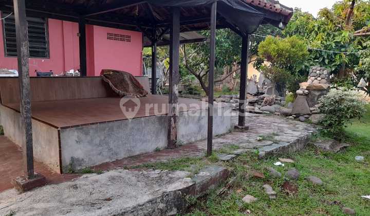 RUMAH DENGAN TANAH YG LUAS GARASI 3 MOBIL 2