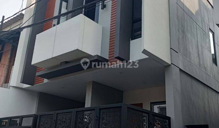 Rumah minimalis modern Tujuh Menitan ke tol kebon Bawang  1