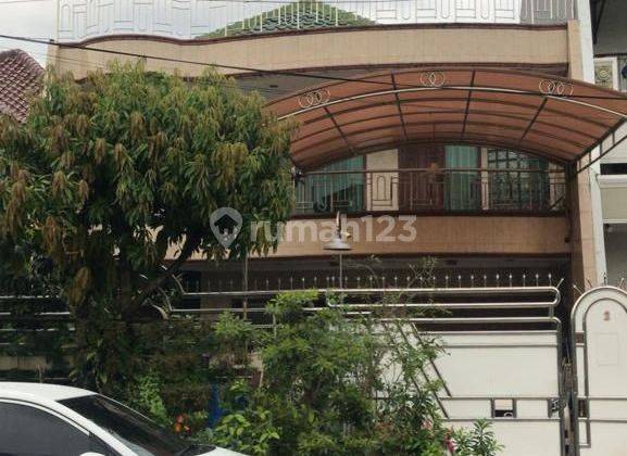 Rumah 2 lantai hadap timur selatan  Taman Surya 5 Jakarta barat 1