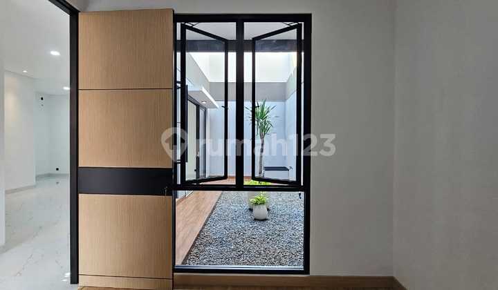 Rumah Modern Akses Strategis 2 Lantai di Camar Bintaro Sektor 3A Lr-17038 2