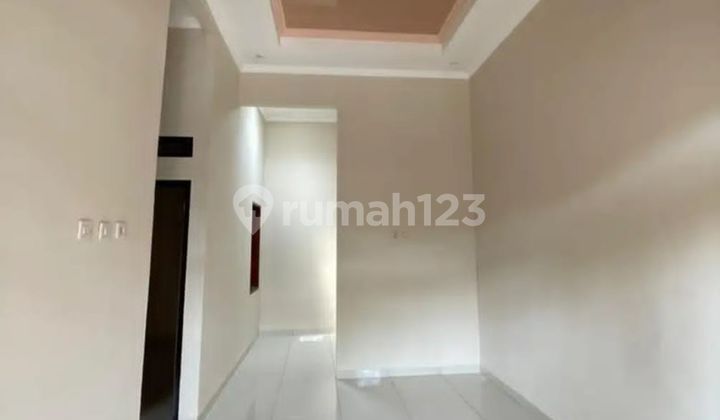 Rumah SHM 3 Menit ke RS. Taman Harapan Baru Siap Huni Dibantu KPR J31758 2