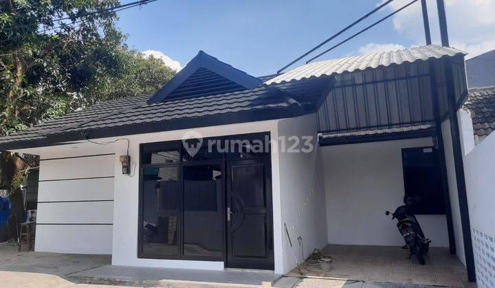 Rumah  rapi, posisi Hoek, halaman luas di Griya Loka, BSD 1