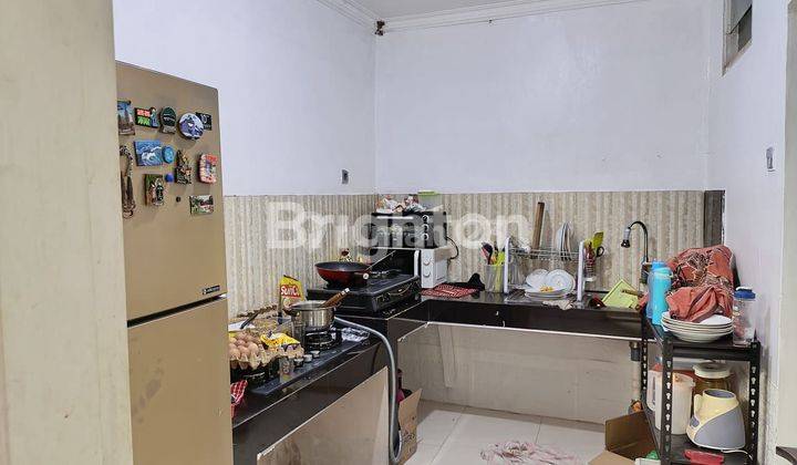 RUMAH TENGAH KOTA BERNUANSA MINIMALIS ELEGAN LOKASI DALAM PERUMAHAN AMAN NYAMAN HARGA NEGO 2