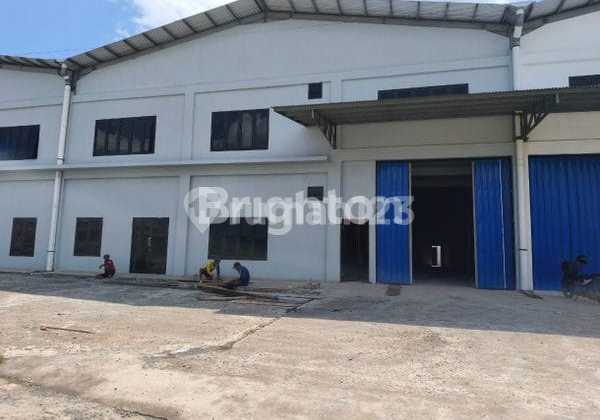 Disewakan Bangunan Baru Gudang Besar Include Kantor Parkiran Luas Lokasi KM 13