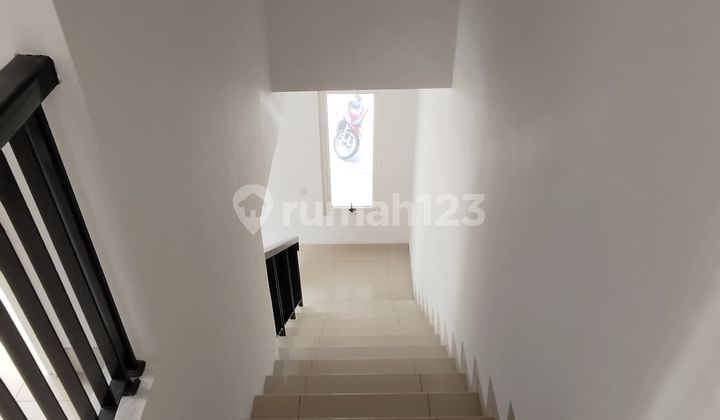 Disewa Rumah Cluster Amerika Hoek Sudah Reno di Green Lake City 2