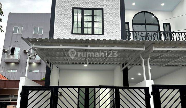 Rumah Baru 3 Lantai Bgn Minimalis Jakarta Barat 1