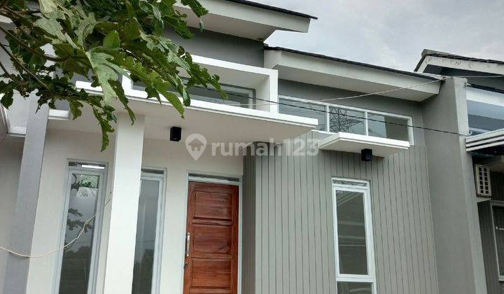 Rumah Syariah Minimalis Modern dalam Perumahan 1