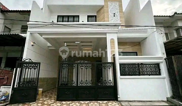 Rumah Baru 2 Lantai Siap Huni Lokasi Babatan Pantai Surabaya