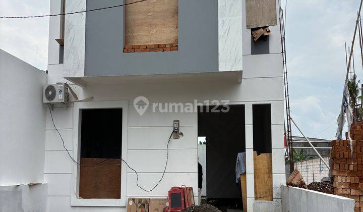 Rumah 2lt Cluster 600jtan Dekat Jalan Utama Wolter Monginsidi 1