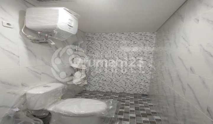 Rumah Siap Huni Bangunan Masih Baru di Taman Holis Indah 2