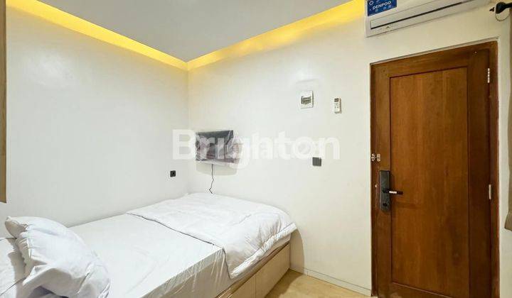 NEW studio apartment BYPASS NGURAH RAI, BALI, 3 FLOORS, 14 ROOMS FULLY FURNISHED, STRATEGIC, GOLDEN QUADRANGLE AREA OF BALI, NEAR TOLL ROAD AND TOURIST ATTRACTIONS Bypass Sanur - Denpasar 2