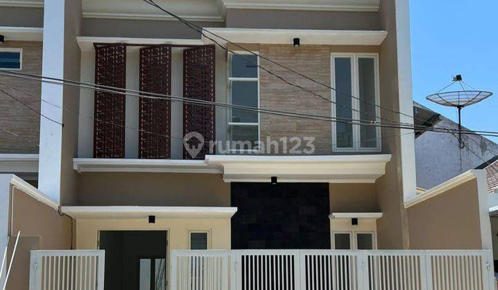 Rumah Modern Gress Manyar Kertoadi Row Lebar  1