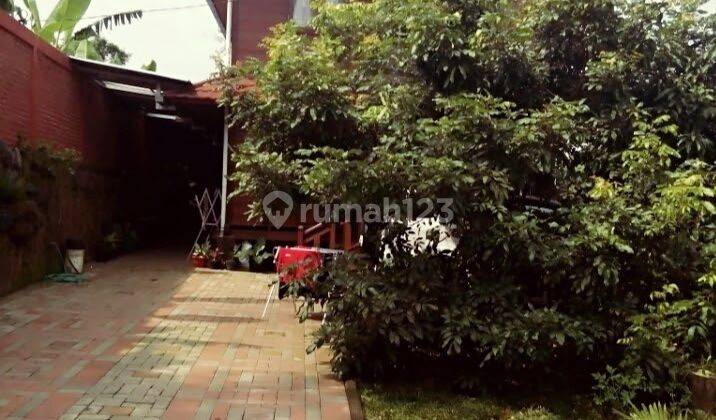 Di jual Rumah kayu dempo lokasi main road 2