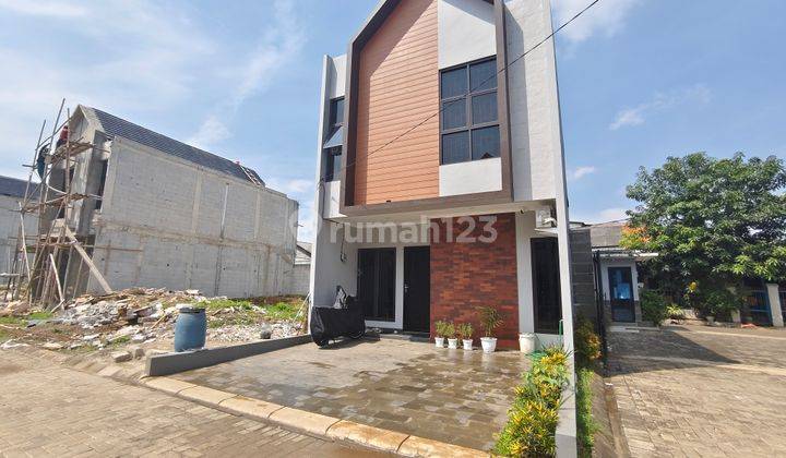 Hanya 500 meter dari pintu tol beca kayu rumah di pondok kelapa 1